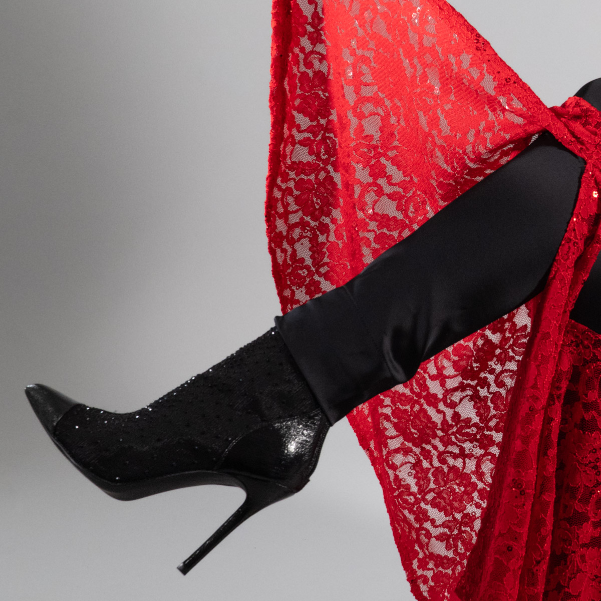 dancing woman on concrete pavement